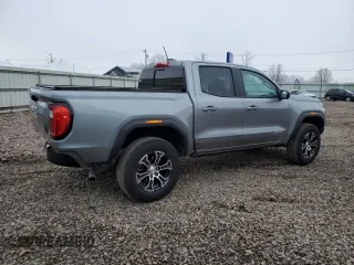 2023 GMC Canyon 4WD AT4 with VIN 1GTP6DEK5P1170230, listed as a Copart auction lot 52767295 with 26,769 mi miles and Salvage Title. Bid and sale history available at carsss.com. Image 3.