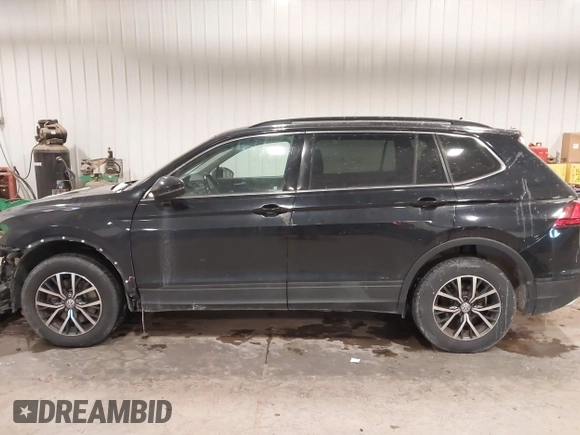2019 Volkswagen Tiguan SE with VIN 3VV2B7AX3KM017948, listed as a IAAI auction lot 41564360 with 129,302 mi miles and . Bid and sale history available at DreamBid. Image 15.