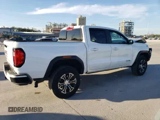 2023 GMC Canyon 4WD AT4 with VIN 1GTP6DEK6P1237045, listed as a Copart auction lot 74981784 with 18,036 mi miles and Salvage Title. Bid and sale history available at carsss.com. Image 3.