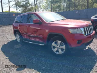 2011 Jeep Grand Cherokee Laredo with VIN 1J4RR4GG5BC512095, listed as a IAAI auction lot 42156490 with 160,749 mi miles. Bid and sale history available at carsss.com. Image 1.