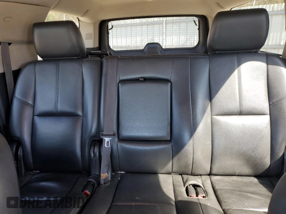 2014 Chevrolet Suburban LT with VIN 1GNSCJE01ER117627, listed as a Copart auction lot 46075985 with 258,564 mi miles and Salvage Title. Bid and sale history available at carsss.com. Image 10.