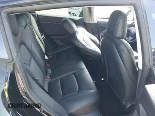 2021 Tesla Model 3 Standard Range Plus z VIN 5YJ3E1EA5MF939299, wystawiony jako IAAI lot #42146702 z przebiegiem 43 382 mil mil oraz . Historia ofert i sprzedaży dostępna na DreamBid. Obrazek 8.