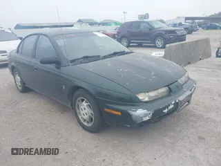 1997 Saturn SL z VIN 1G8ZJ5278VZ336438, wystawiony jako IAAI lot #42321437 z przebiegiem 198 940 mil mil oraz . Historia ofert i sprzedaży dostępna na DreamBid. Obrazek 1.