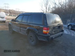 1996 Jeep Grand Cherokee Laredo with VIN 1J4GZ58S3TC197587, listed as a IAAI auction lot 41423318 with 200,116 mi miles. Bid and sale history available at carsss.com. Image 3.