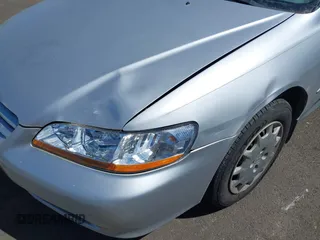 2002 Honda Accord LX with VIN 1HGCG56422A167829, listed as a IAAI auction lot 42401497 with 221,550 mi miles and . Bid and sale history available at DreamBid. Image 6.
