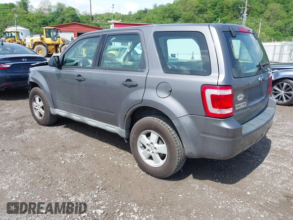 2009 Ford Escape XLS z VIN 1FMCU02709KC11692, wystawiony jako IAAI lot #42202890 z przebiegiem 155 243 mil mil oraz . Historia ofert i sprzedaży dostępna na DreamBid. Obrazek 3.