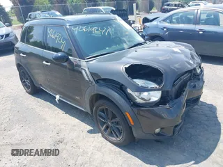 2015 MINI Countryman S with VIN WMWZC5C50FWP43490, listed as a IAAI auction lot 42619241 with 132,140 mi miles and . Bid and sale history available at DreamBid. Image 1.