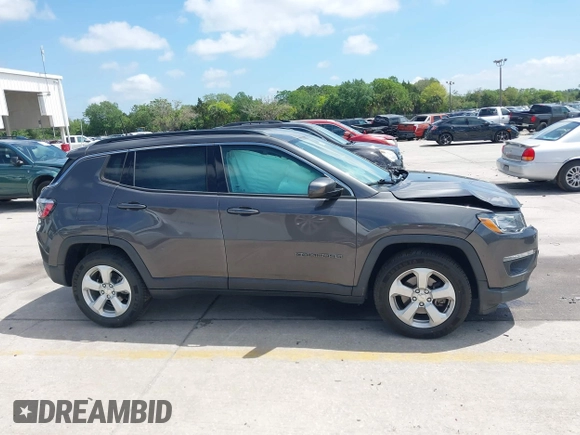 2020 Jeep Compass Latitude with VIN 3C4NJCBB3LT136018, listed as a IAAI auction lot 41915073 with 80,785 mi miles and . Bid and sale history available at carsss.com. Image 13.