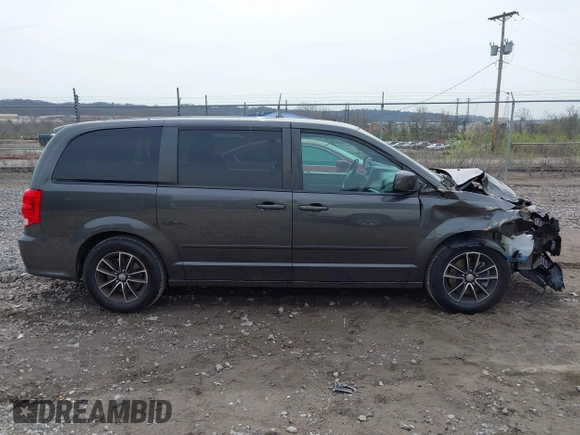 2016 Dodge Grand Caravan SE with VIN 2C4RDGBG1GR388807, listed as a IAAI auction lot 42010574 with 140,103 mi miles and . Bid and sale history available at DreamBid. Image 14.