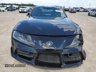 2021 Toyota GR Supra 3.0 with VIN WZ1DB0C00MW042681, listed as a Copart auction lot 59174324 with 7,718 mi miles and Salvage Title. Bid and sale history available at carsss.com. Image 5.