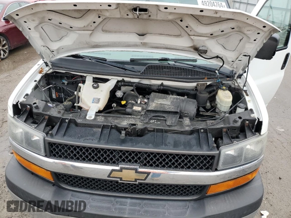 2013 Chevrolet Express Passenger 1LT с VIN 1GAZGYFG4D1190237, выставлен на аукционе Copart как лот 49204764 с пробегом 159 160 миль миль и Списание • Salvage title. История ставок и продаж доступна на DreamBid. Изображение 12.