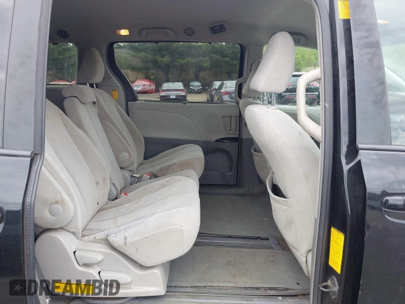 2014 Toyota Sienna LE AAS with VIN 5TDKK3DC0ES487830, listed as a IAAI auction lot 42216342 with 155,973 mi miles and . Bid and sale history available at carsss.com. Image 8.