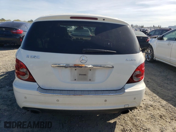 2009 Mercedes-Benz R 3.5L with VIN 4JGCB65E69A095293, listed as a Copart auction lot 50467065 with 188,676 mi miles and Salvage Title. Bid and sale history available at DreamBid. Image 7.