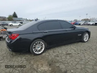 2015 BMW 7 Series 750Li with VIN WBAYE8C54FD782389, listed as a Copart auction lot 45150445 with 122,788 mi miles and Clean Title. Bid and sale history available at carsss.com. Image 3.