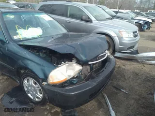 1998 Honda Civic LX with VIN 2HGEJ6676WH602966, listed as a IAAI auction lot 39722428 with 153,245 mi miles. Bid and sale history available at carsss.com. Image 6.