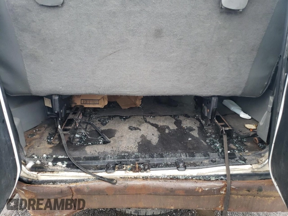2009 Ford Econoline Passenger XL с VIN 1FBSS31L99DA16804, выставлен на аукционе Copart как лот 72063654 с пробегом Не указан миль и Списание • Salvage title. История ставок и продаж доступна на DreamBid. Изображение 10.