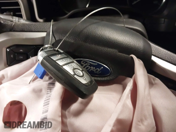 2020 Ford F-150 XL with VIN 1FTEW1E46LFC05572, listed as a IAAI auction lot 41611304 with 150,106 mi miles and . Bid and sale history available at DreamBid. Image 11.