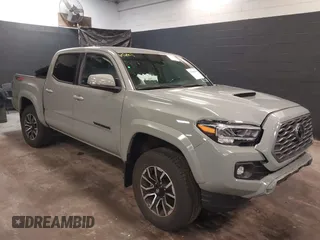 2023 Toyota Tacoma 4WD SR with VIN 3TMCZ5ANXPM607489, listed as a IAAI auction lot 41605018 with 15,229 mi miles. Bid and sale history available at carsss.com. Image 1.