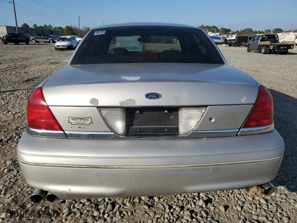2004 Ford Crown Victoria LX with VIN 2FDFP74W74X150801, listed as a Copart auction lot 43869115 with 138,243 mi miles and Salvage Title. Bid and sale history available at carsss.com. Image 6.