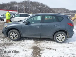 2013 Mazda CX-5 Sport z VIN JM3KE2BE9D0156274, wystawiony jako IAAI lot #41624466 z przebiegiem 159 017 mil mil oraz . Historia ofert i sprzedaży dostępna na DreamBid. Obrazek 14.