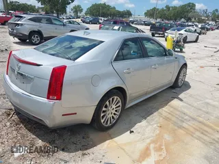 2012 Cadillac CTS with VIN 1G6DC5E53C0157278, listed as a IAAI auction lot 42425392 with 151,991 mi miles and . Bid and sale history available at DreamBid. Image 4.