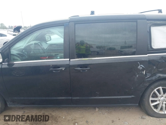 2018 Dodge Grand Caravan SXT with VIN 2C4RDGCGXJR283091, listed as a IAAI auction lot 41966553 with 102,309 mi miles and . Bid and sale history available at DreamBid. Image 14.