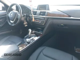 2015 BMW 3 Series 328i with VIN WBA3C1C53FK120984, listed as a IAAI auction lot 41338035 with 119,486 mi miles and . Bid and sale history available at carsss.com. Image 5.