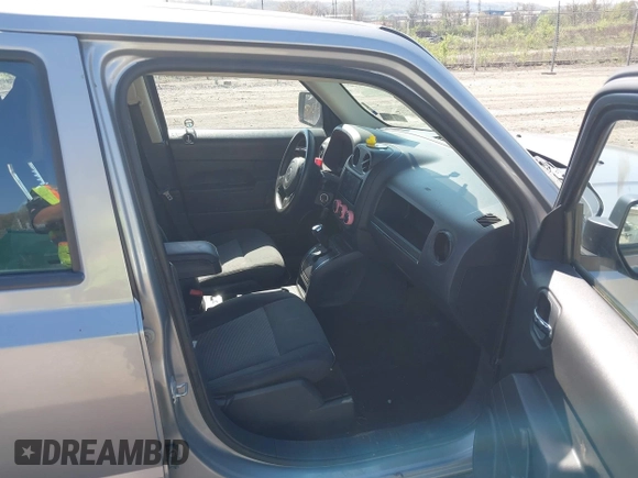 2015 Jeep Patriot High Altitude with VIN 1C4NJRAB9FD353751, listed as a IAAI auction lot 42099206 with 62,569 mi miles. Bid and sale history available at carsss.com. Image 5.
