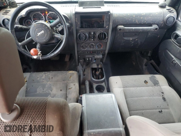 2007 Jeep Wrangler Unlimited Rubicon with VIN 1J4GA69117L112867, listed as a Copart auction lot 59909565 with 166,963 mi miles and Salvage title. Bid and sale history available at DreamBid. Image 8.