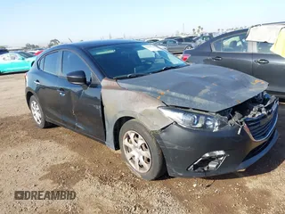 2015 Mazda 3 i Sport with VIN JM1BM1K74F1240619, listed as a IAAI auction lot 41969336 with 202,087 mi miles and . Bid and sale history available at DreamBid. Image 1.