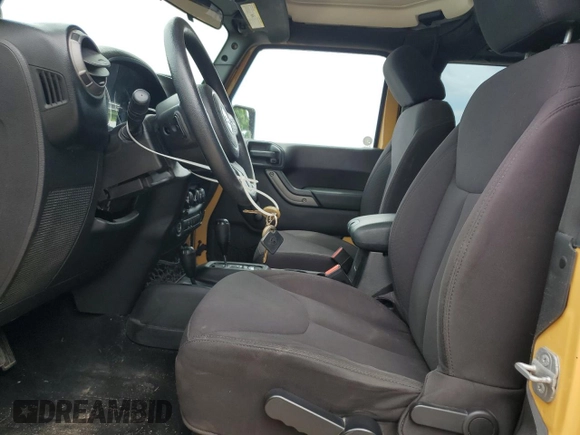 2014 Jeep Wrangler Sport with VIN 1C4AJWAG9EL190595, listed as a Copart auction lot 62496955 with 248,484 mi miles and Salvage title. Bid and sale history available at DreamBid. Image 7.