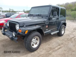 2001 Jeep Wrangler Sahara with VIN 1J4FA59S81P321733, listed as a IAAI auction lot 42164863 with 174,509 mi miles. Bid and sale history available at carsss.com. Image 2.