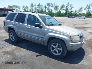 2002 Jeep Grand Cherokee Limited z VIN 1J4GX58N62C189109, wystawiony jako IAAI lot #42268734 z przebiegiem 148 720 mil mil oraz . Historia ofert i sprzedaży dostępna na DreamBid. Obrazek 1.