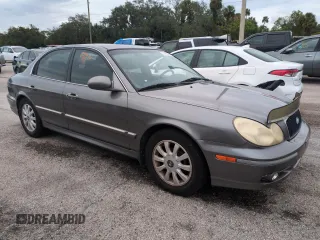 2003 Hyundai Sonata GLS with VIN KMHWF35HX3A866677, listed as a Copart auction lot 74620514 with 0 mi miles and Salvage Title. Bid and sale history available at carsss.com. Image 4.