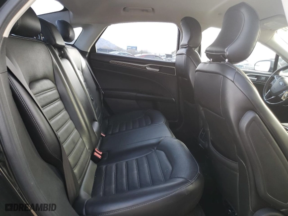 2015 Ford Fusion Energi SE Luxury with VIN 3FA6P0PU2FR284308, listed as a Copart auction lot 82698354 with 0 mi miles and Salvage Title. Bid and sale history available at carsss.com. Image 11.
