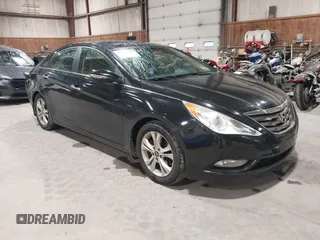 2012 Hyundai Sonata SE z VIN 5NPEC4AC9CH355351, wystawiony jako IAAI lot #42318588 z przebiegiem 122 864 mil mil oraz . Historia ofert i sprzedaży dostępna na DreamBid. Obrazek 1.
