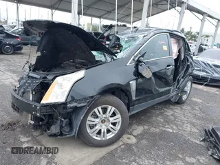 2015 Cadillac SRX with VIN 3GYFNAE36FS573940, listed as a IAAI auction lot 41808779 with Not Provided miles and . Bid and sale history available at DreamBid. Image 16.