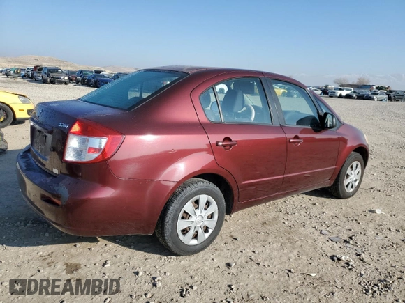 2009 Suzuki SX4 Man FWD with VIN JS2YC412696201399, listed as a Copart auction lot 87543165 with 150,739 mi miles and Salvage Title. Bid and sale history available at carsss.com. Image 3.