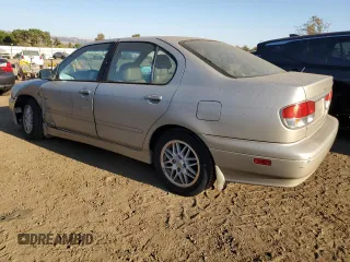 2001 Infiniti G20 Luxury z VIN JNKCP11A01T400404, wystawiony jako Copart lot #69899274 z przebiegiem 243 332 mil mil oraz Szkody całkowita. Historia ofert i sprzedaży dostępna na DreamBid. Obrazek 2.