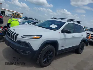 2014 Jeep Cherokee Trailhawk with VIN 1C4PJMBS5EW231448, listed as a IAAI auction lot 42632143 with 97,461 mi miles and . Bid and sale history available at DreamBid. Image 18.