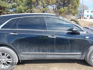 2020 Cadillac XT5 Premium Luxury AWD with VIN 1GYKNDRS3LZ107687, listed as a IAAI auction lot 41887306 with 54,959 mi miles and . Bid and sale history available at DreamBid. Image 13.