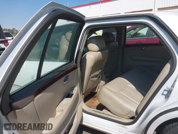 2006 Cadillac DTS w/1SC with VIN 1G6KD57Y56U132648, listed as a IAAI auction lot 41862030 with 128,003 mi miles. Bid and sale history available at carsss.com. Image 8.