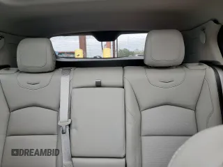 2023 Cadillac XT4 FWD Premium Luxury z VIN 1GYFZCR44PF105116, wystawiony jako Copart lot #51945915 z przebiegiem 20 669 mil mil oraz Szkoda całkowita • Salvage title. Historia ofert i sprzedaży dostępna na DreamBid. Obrazek 10.