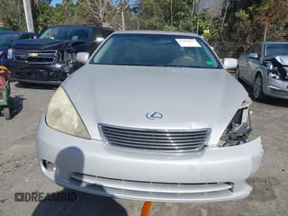 2005 Lexus ES 330 with VIN JTHBA30G555100804, listed as a IAAI auction lot 41595677 with 259,404 mi miles. Bid and sale history available at carsss.com. Image 12.
