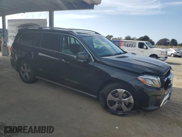 2018 Mercedes-Benz GLS with VIN 4JGDF6EE2JB076621, listed as a Copart auction lot 54197195 with 66,493 mi miles and Salvage Title. Bid and sale history available at carsss.com. Image 4.