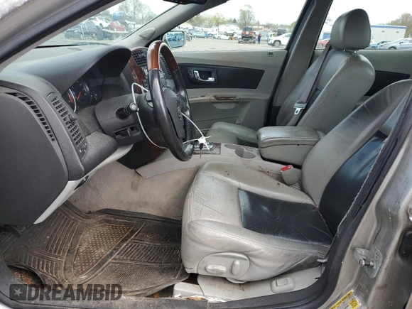 2007 Cadillac CTS z VIN 1G6DM57T570173254, wystawiony jako Copart lot #50364605 z przebiegiem 136 563 mil mil oraz Szkoda całkowita • Salvage title. Historia ofert i sprzedaży dostępna na DreamBid. Obrazek 7.