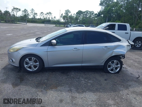 2013 Ford Focus SE with VIN 1FADP3F28DL217636, listed as a IAAI auction lot 42465123 with 187,088 mi miles and . Bid and sale history available at DreamBid. Image 15.