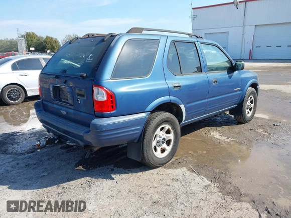 2004 Isuzu Rodeo S with VIN 4S2CK58W944317209, listed as a IAAI auction lot 41498160 with 114,764 mi miles and . Bid and sale history available at DreamBid. Image 4.