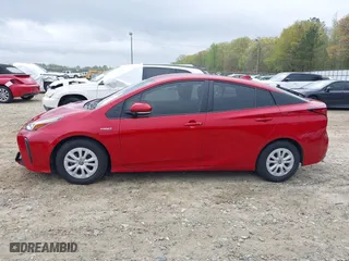 2021 Toyota Prius L Eco with VIN JTDKAMFU6M3134586, listed as a IAAI auction lot 41909538 with 55,355 mi miles. Bid and sale history available at carsss.com. Image 14.