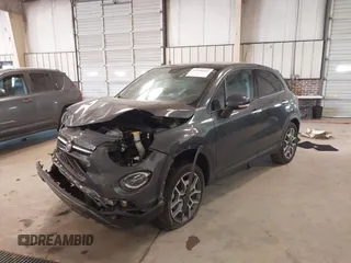 2021 FIAT 500X Trekking with VIN ZFBNF3B17MP909591, listed as a IAAI auction lot 41256551 with 58,688 mi miles and . Bid and sale history available at DreamBid. Image 2.